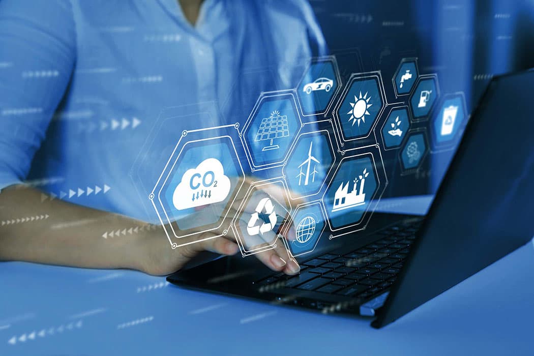 person on a computer looking at supply chain information