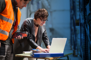 Woman looking at laptop