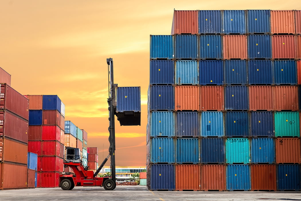 Forklift stacking containers to depict antidumping and countervailing duties