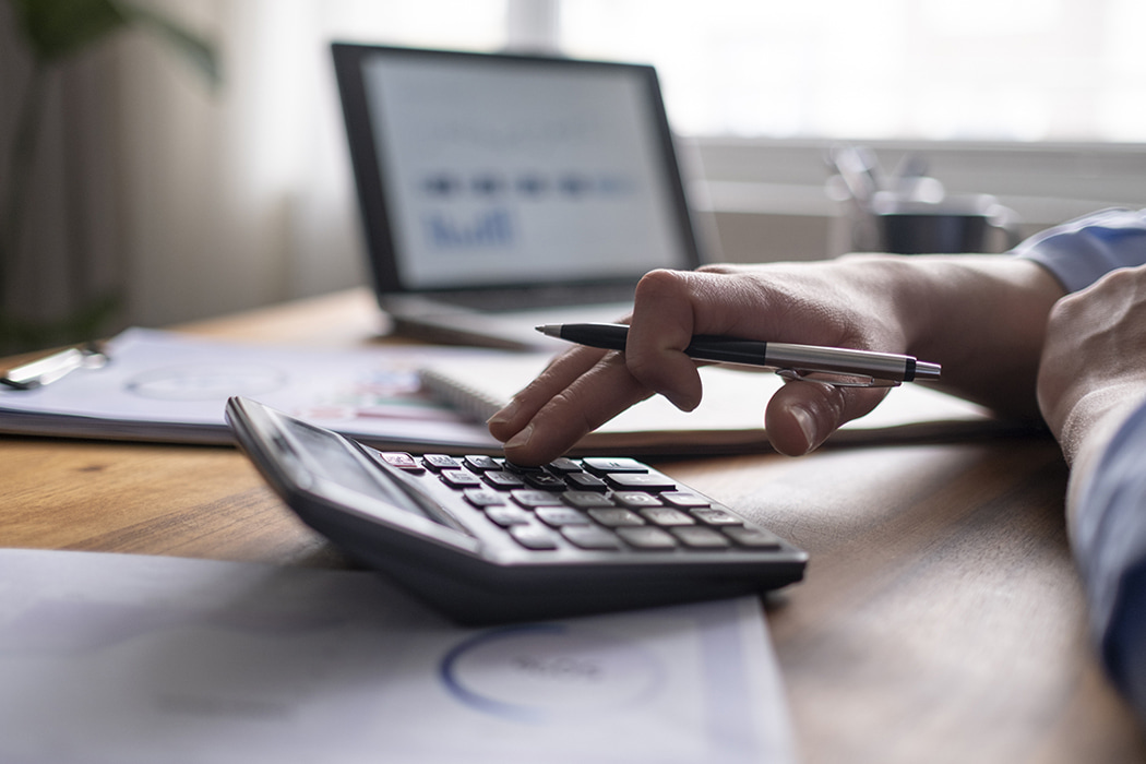 Person using calculator to explore duty drawback